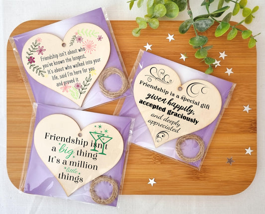 The Plum Penguin Tales of Friendship Encapsulated in Heart Plaques Set