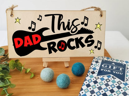 The Plum Penguin Handmade Wooden Hanging Wall Plaque This Dad Rocks Fun Guitar Music Novelty Sign Man Cave Office