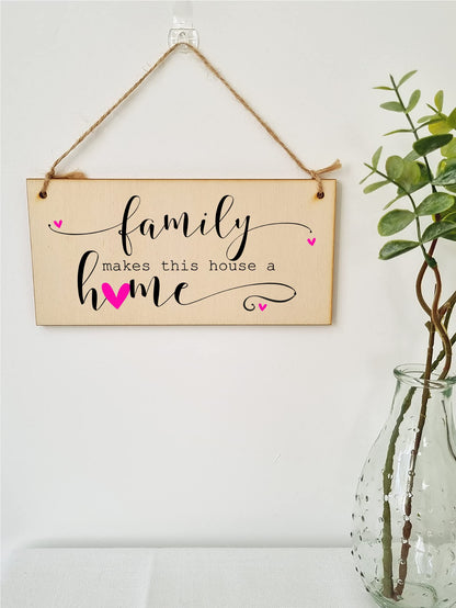 The Plum Penguin Handmade Wooden Hanging Wall Plaque Family Makes this Houose a Home Decorative Sentimental Sign Gift Family